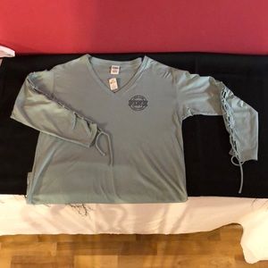 Pink, long sleeved, V-neck T-shirt